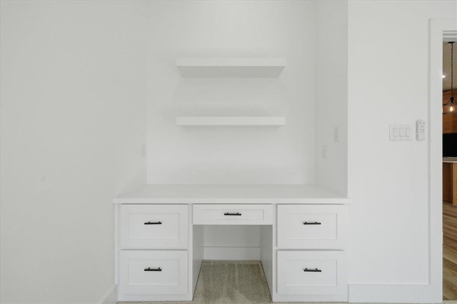 Built in desk for another possible space for a home office