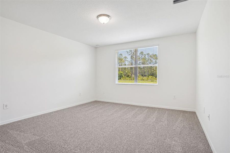 Spacious, unfurnished interior of a new home in Lake Deer Estates - Signature Series, Poinciana (Image 26). Spacious, unfurnished interior of a new home in Lake Deer Estates - Signature Series, Poinciana (Image 26).