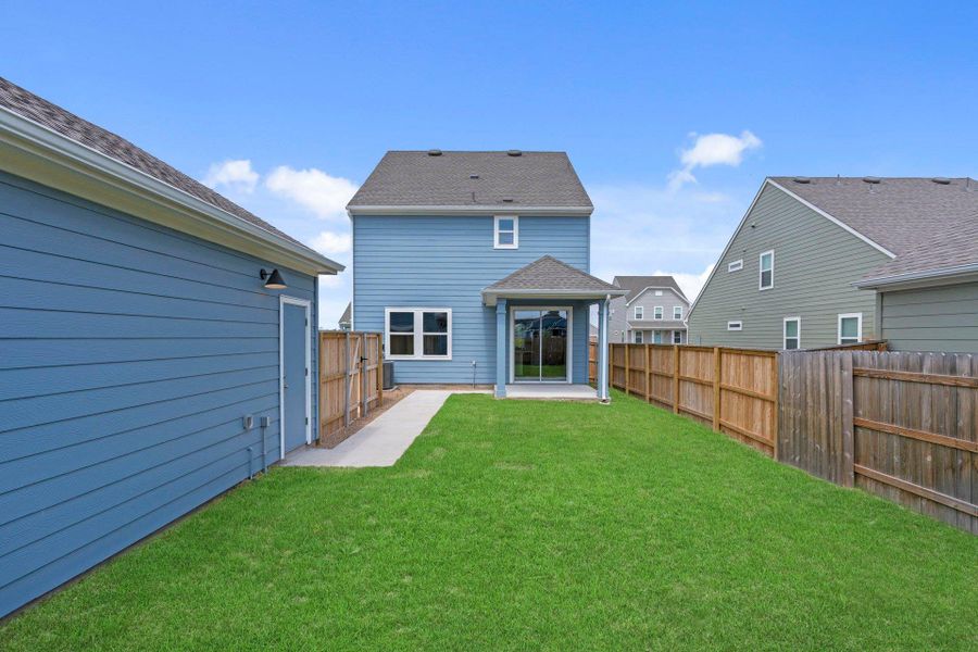 Rear of Home and Private Backyard