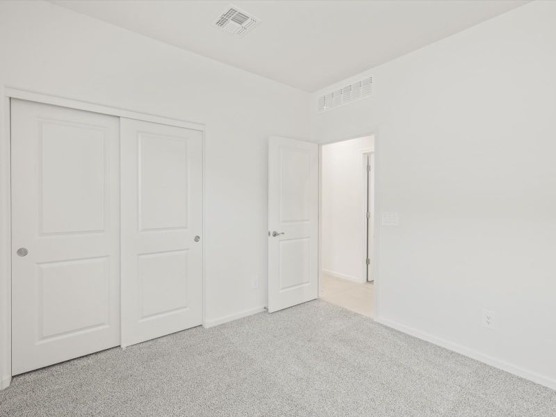 Spacious, unfurnished interior of a new home in Mandarina - Signature Series, Marana (Image 14).