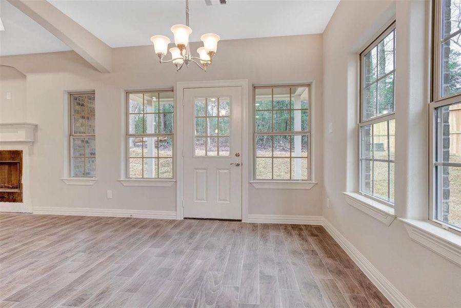 BREAKFAST AREA GOING OUT TO BACK COVERED PORCH BREAKFAST AREA GOING OUT TO BACK COVERED PORCH