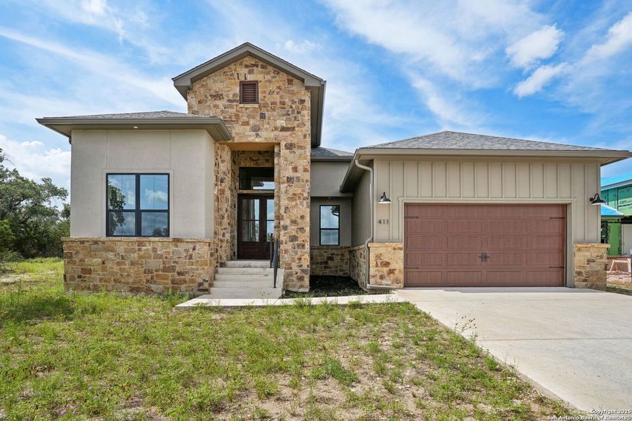 Front exterior of a new home in , Blanco, TX, highlighting curb appeal (Image 1). Front exterior of a new home in , Blanco, TX, highlighting curb appeal (Image 1).
