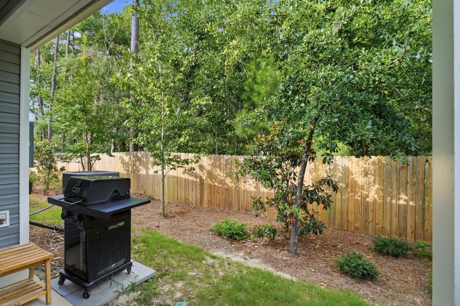 Exterior details and patio area of a home in , Wando (Image 21). Exterior details and patio area of a home in , Wando (Image 21).