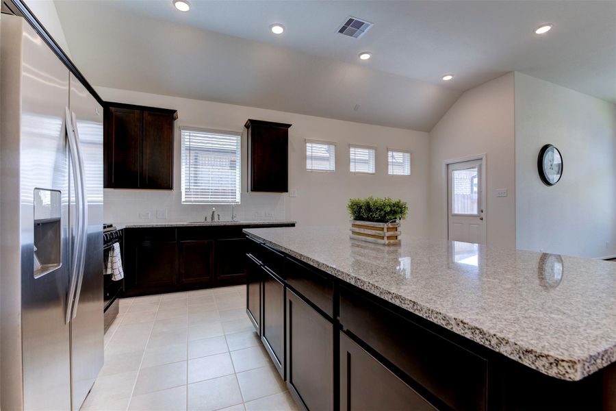 Furnished interior view inside a new home in Sunterra, Katy (Image 10).