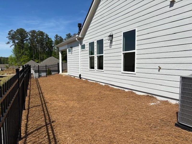 Exterior details and patio area of a home in Echols Farm, Hiram (Image 17).