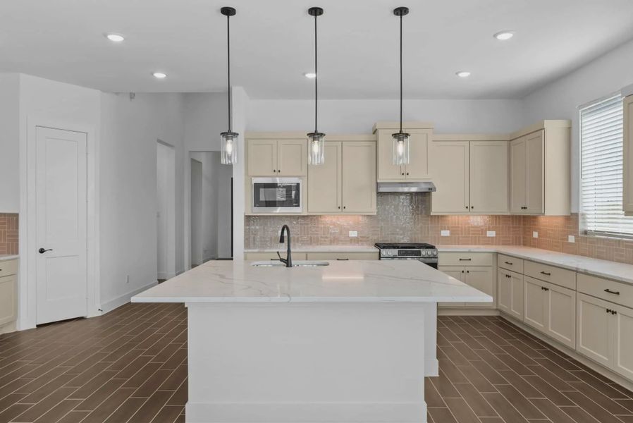 Representative furnished interior of a home built from the Nicklaus by Chesmar Homes in Riceland Alley Loads, Mont Belvieu (Image 6).