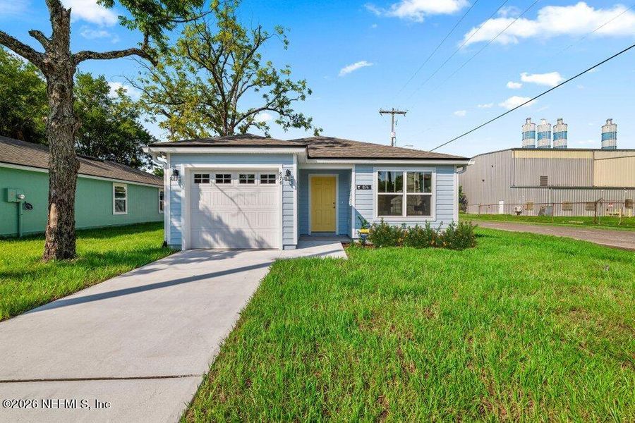 Front exterior of a new home in , Jacksonville, FL, highlighting curb appeal (Image 21).