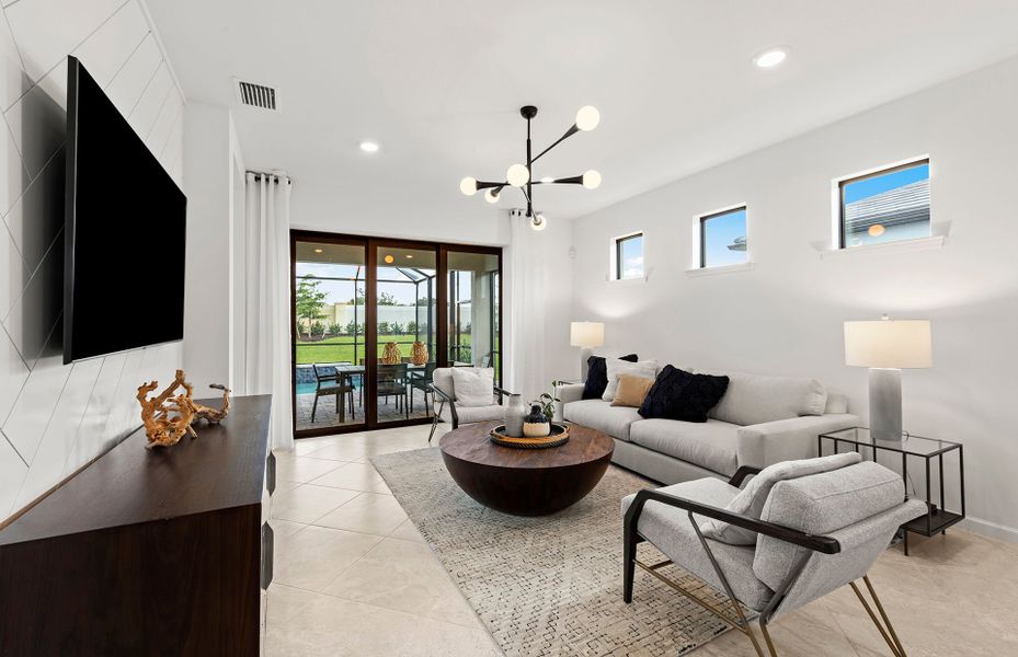 Sliding glass door leading to covered lanai and pool