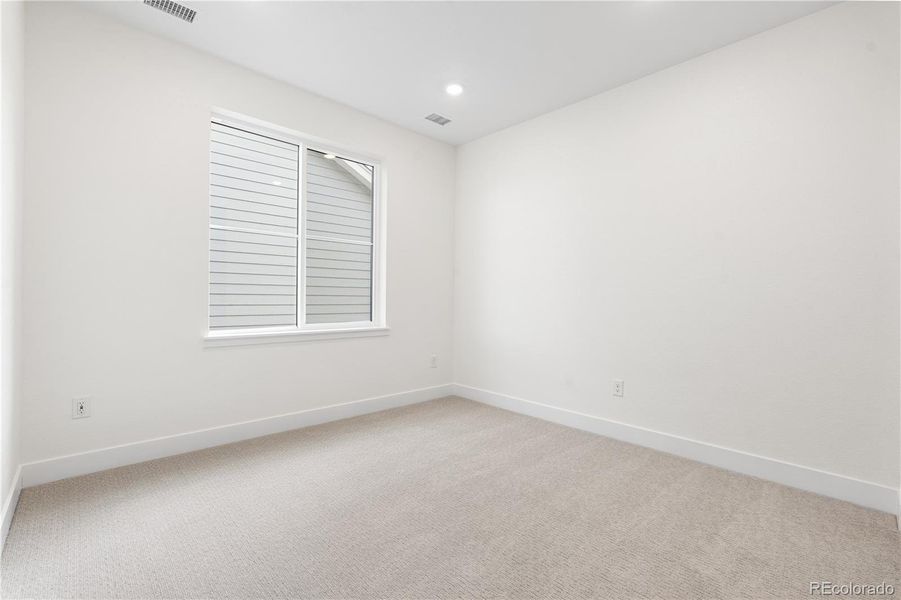 Spacious, unfurnished interior of a new home in Stargaze at Solstice, Littleton (Image 39).