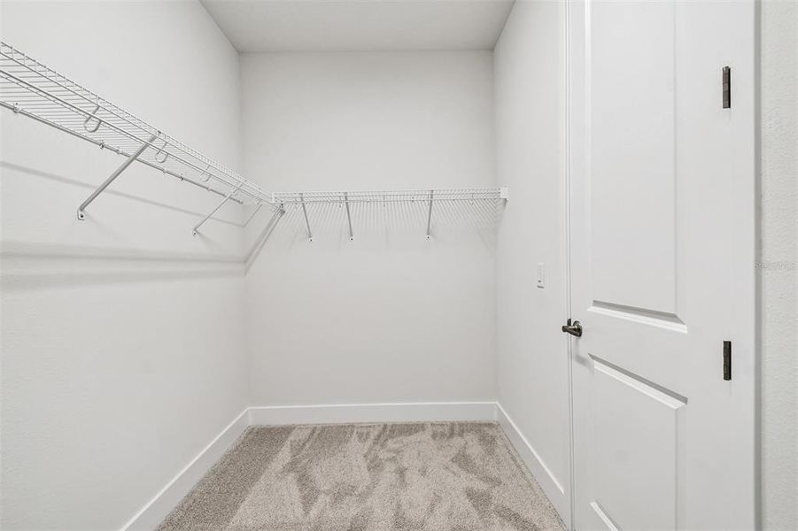 Furnished interior view inside a new home in North River Ranch - Cottage Series, Parrish (Image 9).