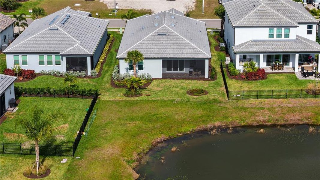 Front exterior of a new home in , Bradenton, FL, highlighting curb appeal (Image 26).