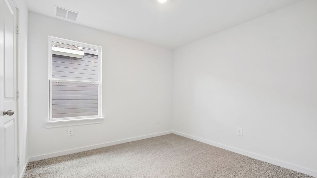 Spacious, unfurnished interior of a new home in Trails at Wildhorse, Austin (Image 29).