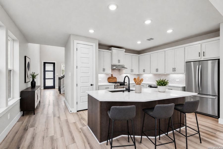 Furnished interior view inside a new home in Crown Ridge Manor, San Antonio (Image 10).