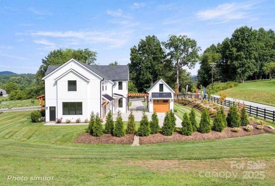 Front exterior of a new home in , Mills River, NC, highlighting curb appeal (Image 21). Front exterior of a new home in , Mills River, NC, highlighting curb appeal (Image 21).