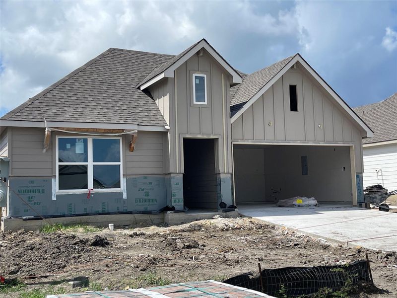 Front exterior of a new home in Liberty Village, Brenham, TX, highlighting curb appeal (Image 1). Front exterior of a new home in Liberty Village, Brenham, TX, highlighting curb appeal (Image 1).