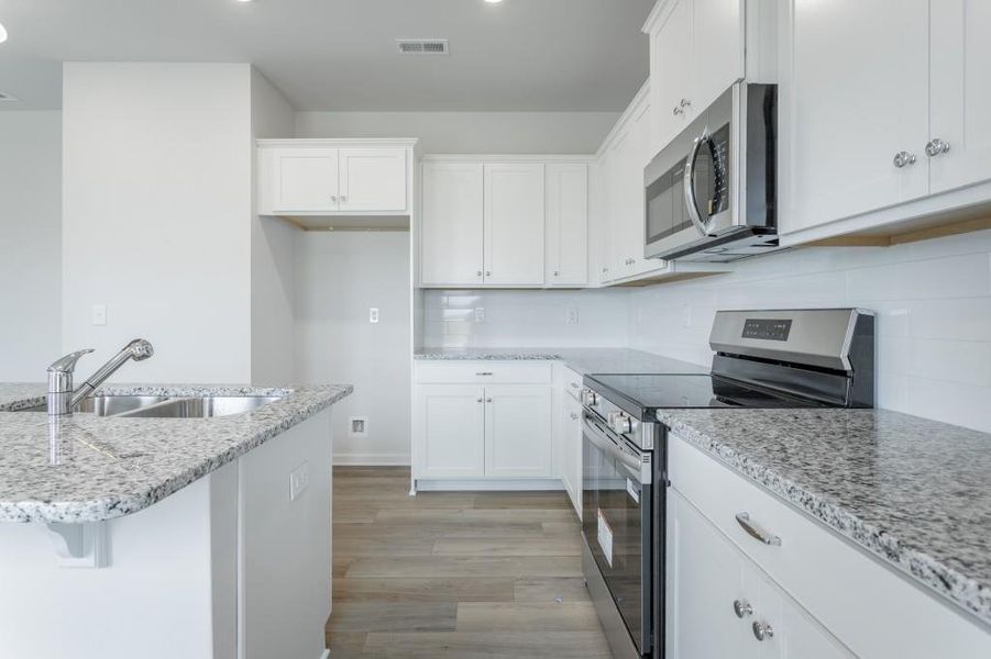 Furnished interior view inside a new home in Laurel Ridge, Rock Spring (Image 18).