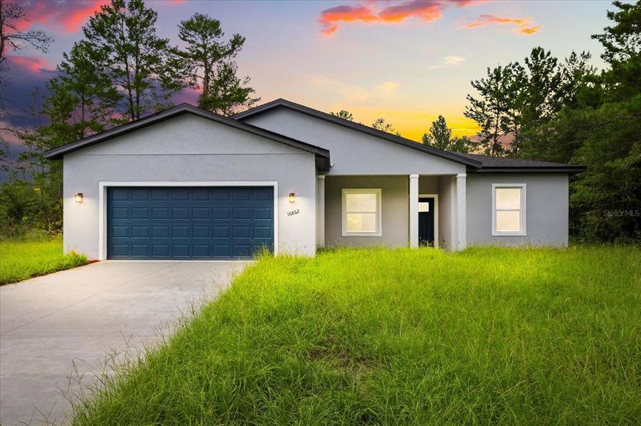 Front exterior of a new home in , Ocala, FL, highlighting curb appeal (Image 1). Front exterior of a new home in , Ocala, FL, highlighting curb appeal (Image 1).