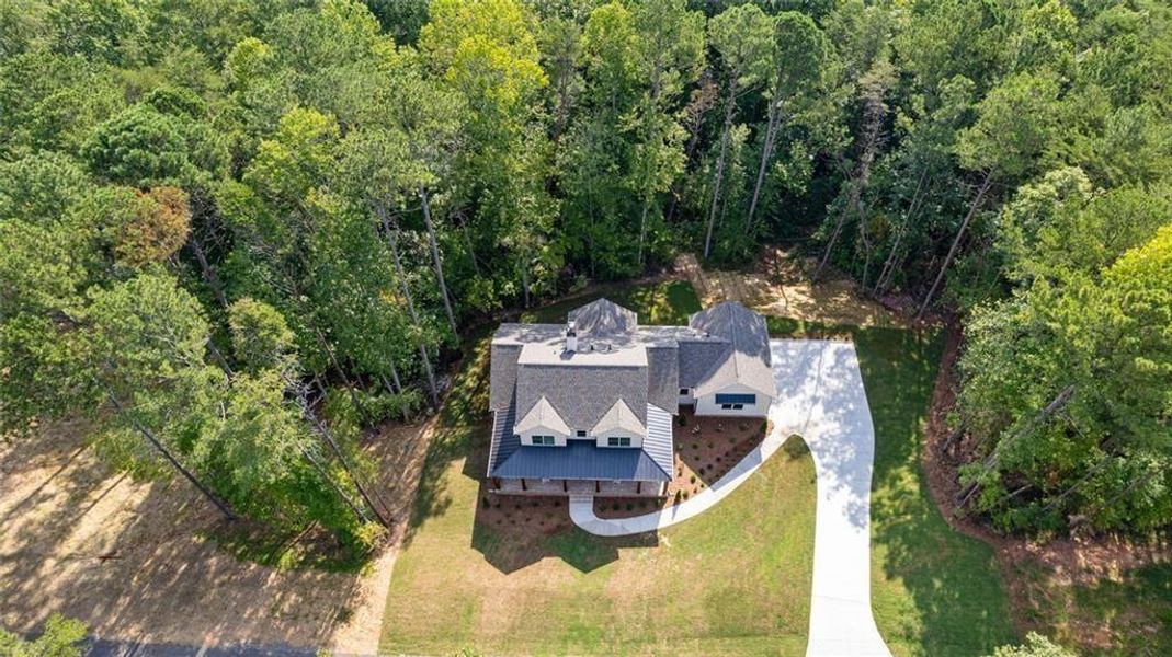 Front exterior of a new home in , Ball Ground, GA, highlighting curb appeal (Image 27).
