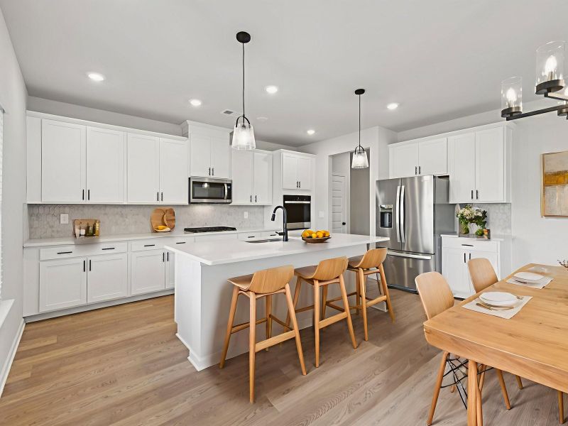 Furnished interior view inside a new home in Vines at Mill Creek - Estate Series, Braselton (Image 4).