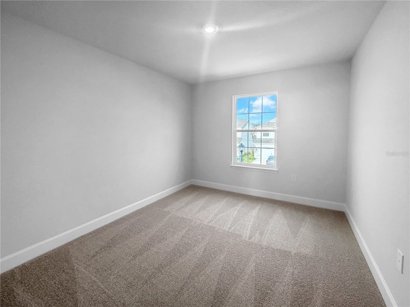 Spacious, unfurnished interior of a new home in Harmony Central, St. Cloud (Image 11).