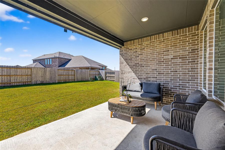 Enjoy the perfect space for entertaining on this inviting covered patio connected to the living area. Enjoy the perfect space for entertaining on this inviting covered patio connected to the living area.