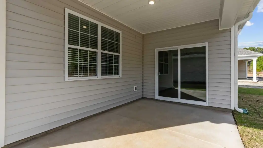 Exterior details and patio area of a home in Chambray, New Bern (Image 2). Exterior details and patio area of a home in Chambray, New Bern (Image 2).