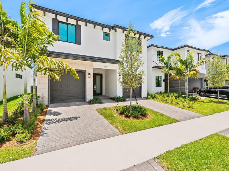 Front exterior of a new home in Marina Landings, Fort Lauderdale, FL, highlighting curb appeal (Image 1). Front exterior of a new home in Marina Landings, Fort Lauderdale, FL, highlighting curb appeal (Image 1).