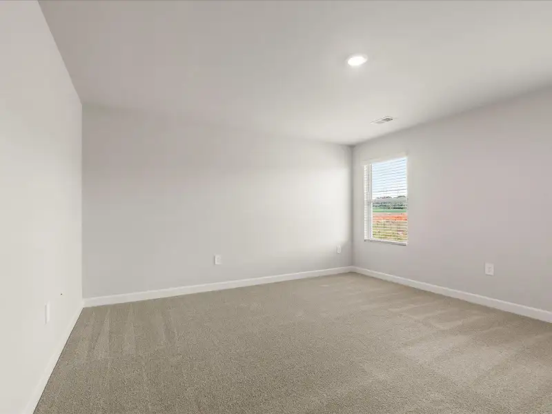 Spacious, unfurnished interior of a new home in Brayfield Manor - Heritage Collection, Wellford (Image 20).