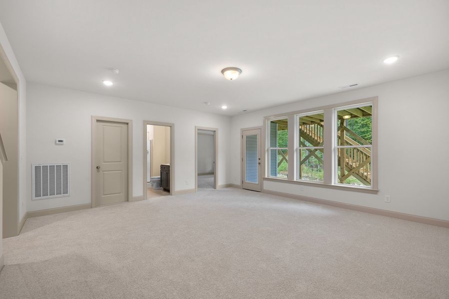 Representative unfurnished interior of a home built from the The Hampton by RobuckHomes in Baylee Ridge, Selma (Image 197).