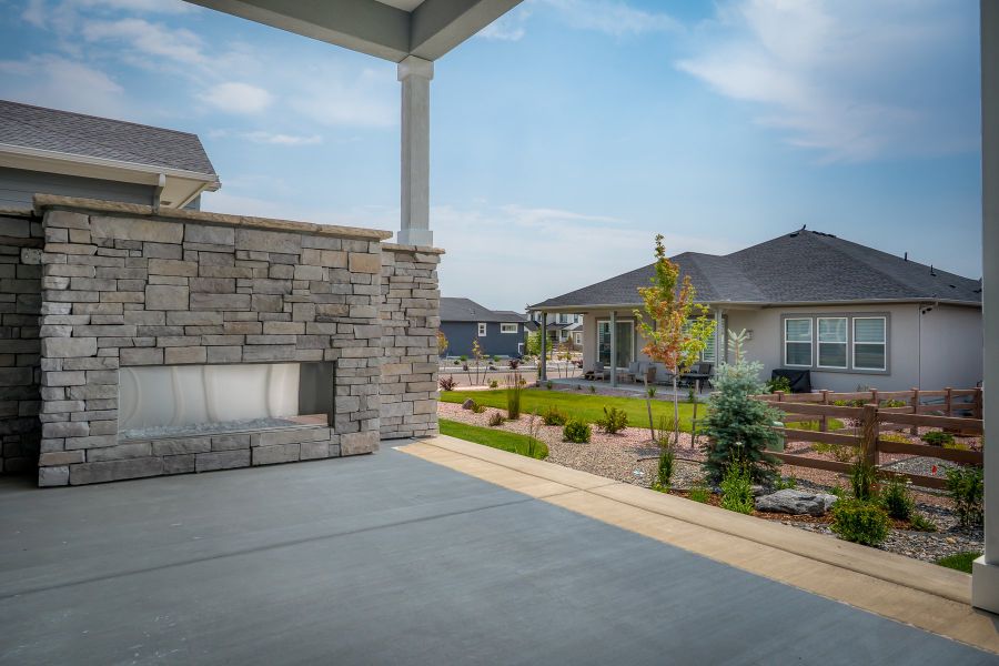 Exterior details and patio area of a home in Wolf Ranch - Enclave Collection, Colorado Springs (Image 4).