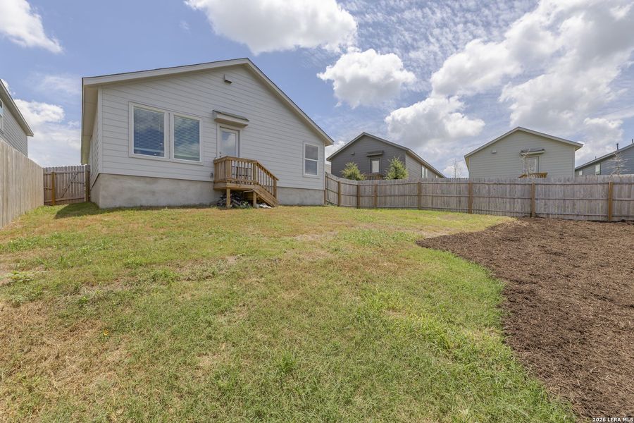 Exterior details and patio area of a home in Brookmill, San Antonio (Image 22).