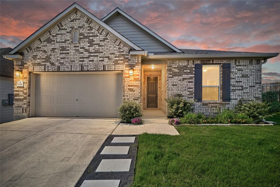 Front exterior of a new home in , Austin, TX, highlighting curb appeal (Image 14).