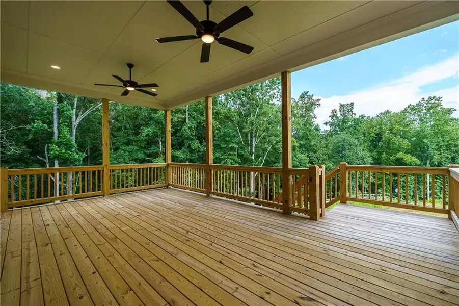 Exterior details and patio area of a home in Malone's Pond, Ball Ground (Image 3).