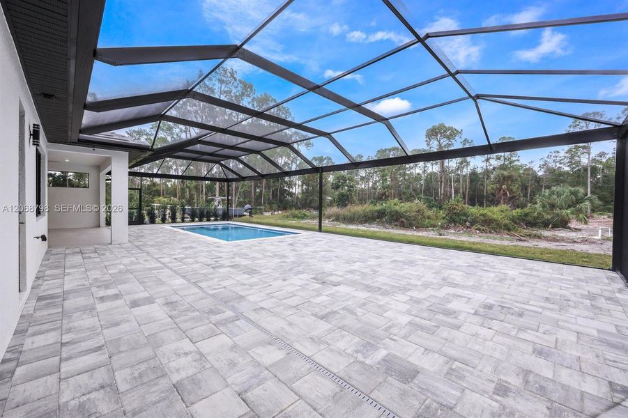Exterior details and patio area of a home in , Naples (Image 3).