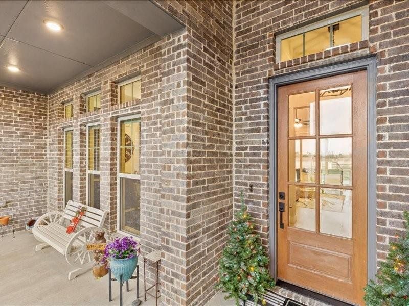Exterior details and patio area of a home in Canterbury Cove, Forney (Image 3).