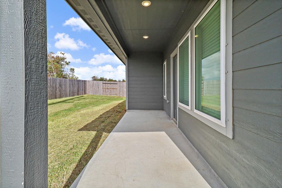 Exterior details and patio area of a home in Heights of Barbers Hill, Baytown (Image 15).