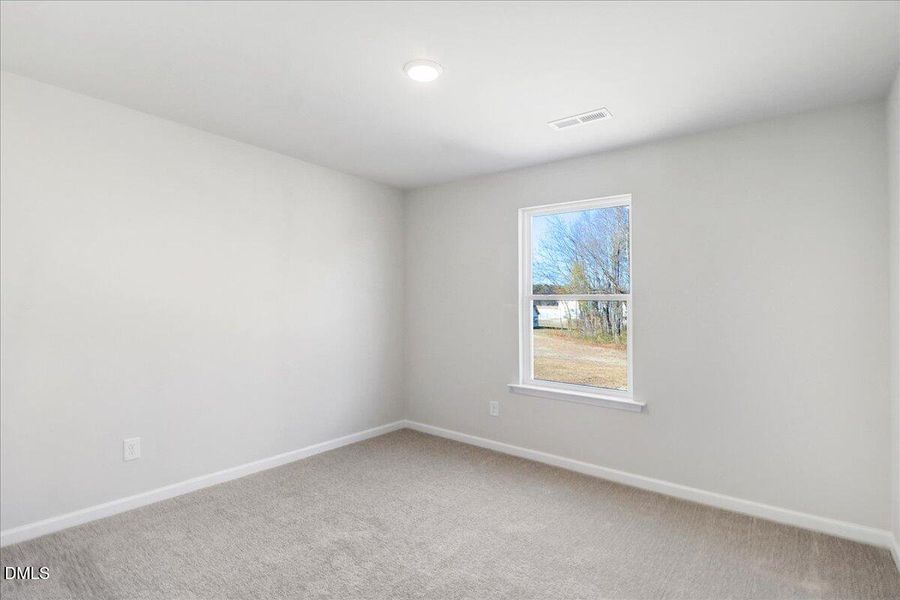 31-Secondary bedroom with carpet in Nash