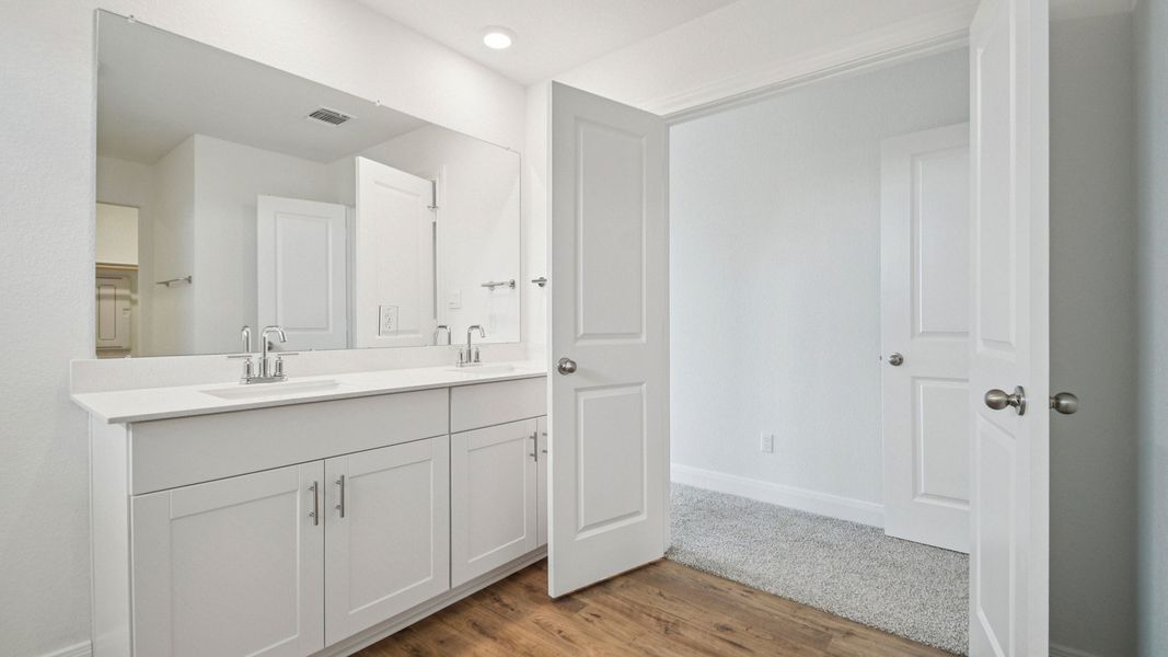Furnished interior view inside a new home in Railhead, Cedar Creek (Image 9).