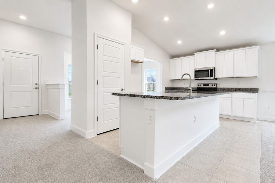 Furnished interior view inside a new home in Harmony Central, St. Cloud (Image 11).