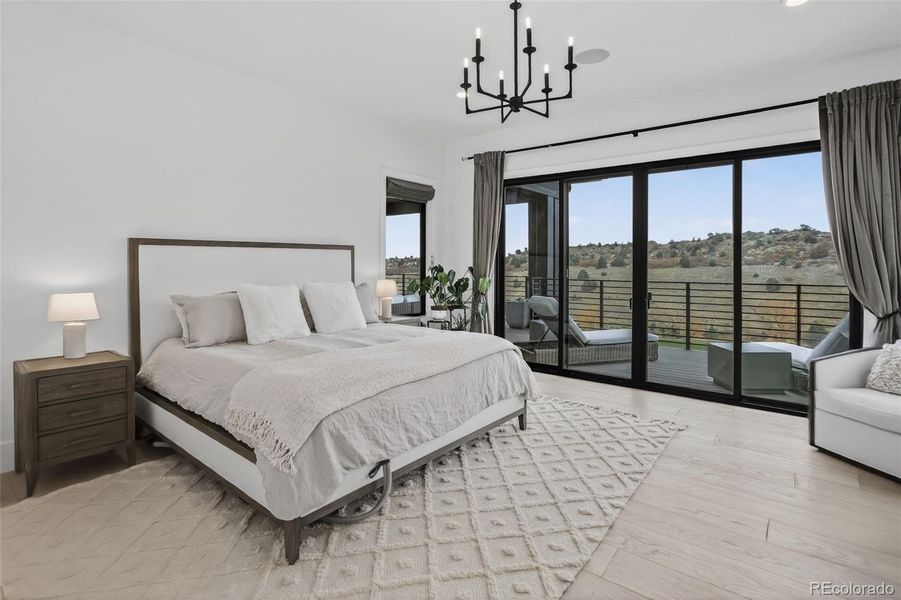 Primary Bedroom with access to back deck Primary Bedroom with access to back deck