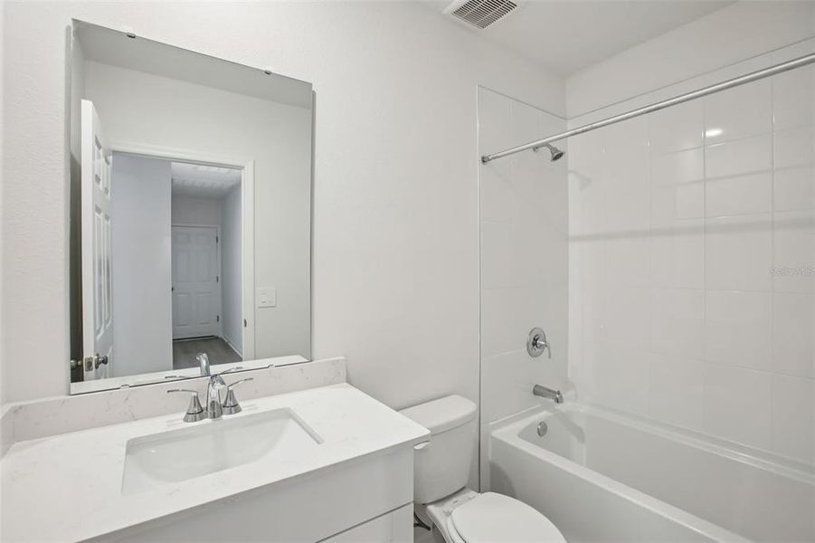 Furnished interior view inside a new home in Villamar - Classic Series, Winter Haven (Image 9).