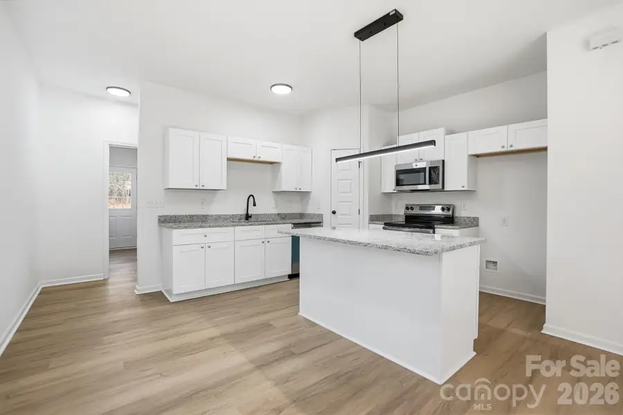 Furnished interior view inside a new home in , Wadesboro (Image 8).
