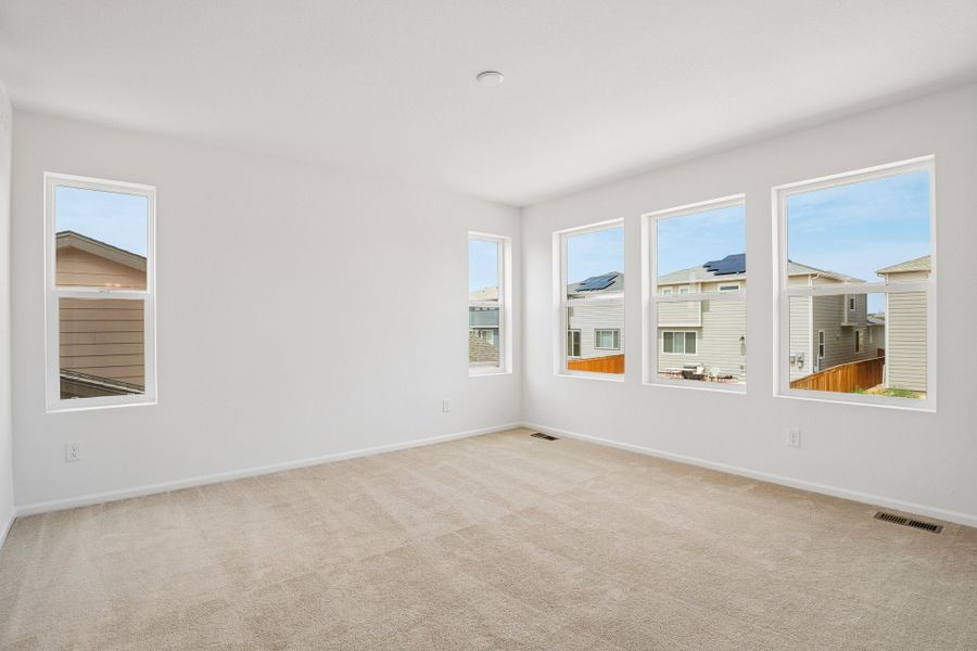 Spacious, unfurnished interior of a new home in The Cottages Collection at Ridgeline Vista, Brighton (Image 16).