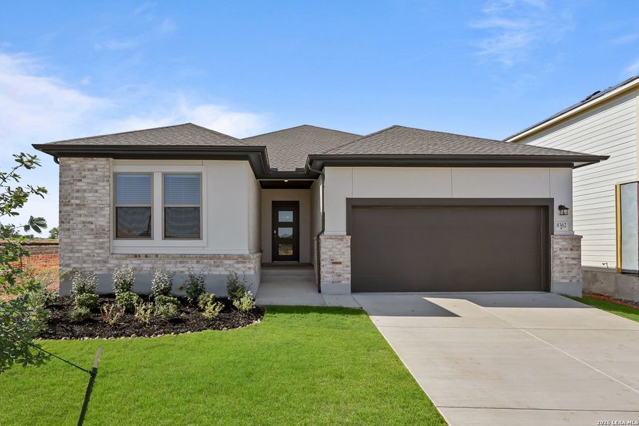 Front exterior of a new home in Garden Grove, San Antonio, TX, highlighting curb appeal (Image 22). Front exterior of a new home in Garden Grove, San Antonio, TX, highlighting curb appeal (Image 22).