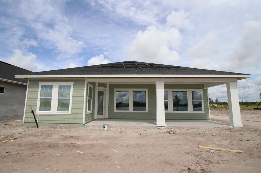 Exterior details and patio area of a home in Laureate Park at Lake Nona - Park Series, Orlando (Image 2).