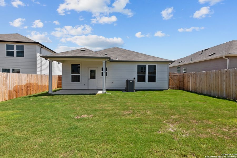 Exterior details and patio area of a home in Lily Springs, Seguin (Image 3).