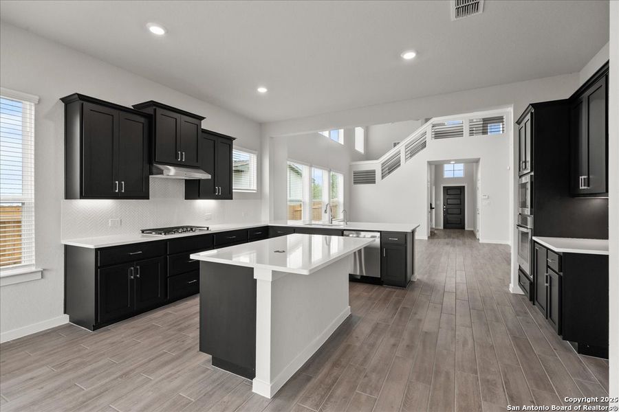 Furnished interior view inside a new home in Village at Three Oaks, Seguin (Image 8). Furnished interior view inside a new home in Village at Three Oaks, Seguin (Image 8).