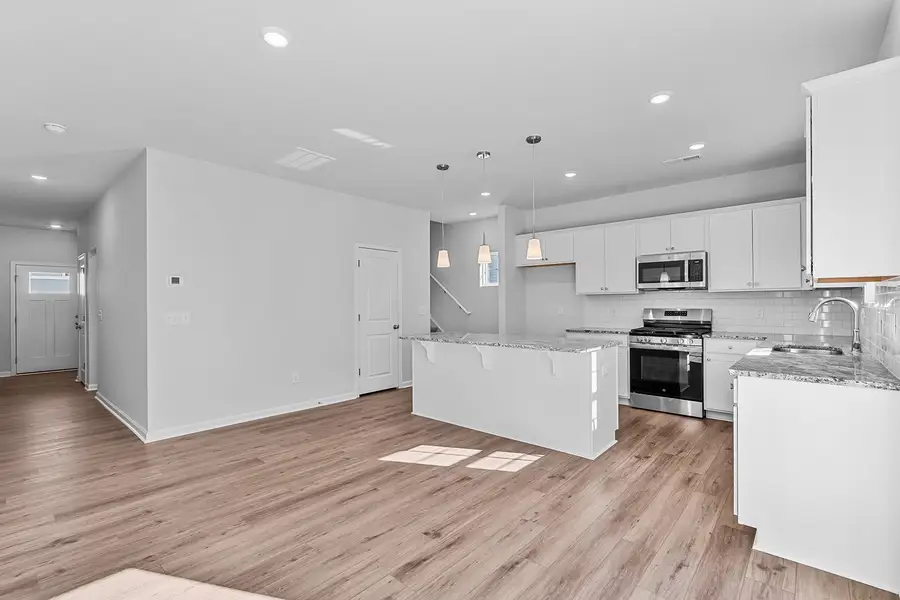 Furnished interior view inside a new home in Fieldstone, Lexington (Image 7).