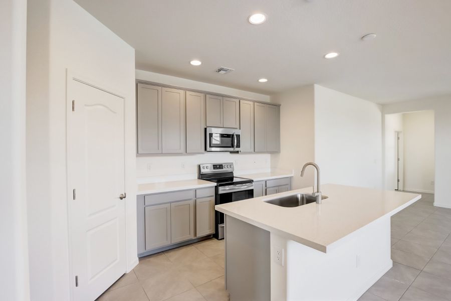 Representative furnished interior of a home built from the Castillo Series - Bluebell by Brightland Homes in Castillo at Anderson Parc, Buckeye (Image 6).