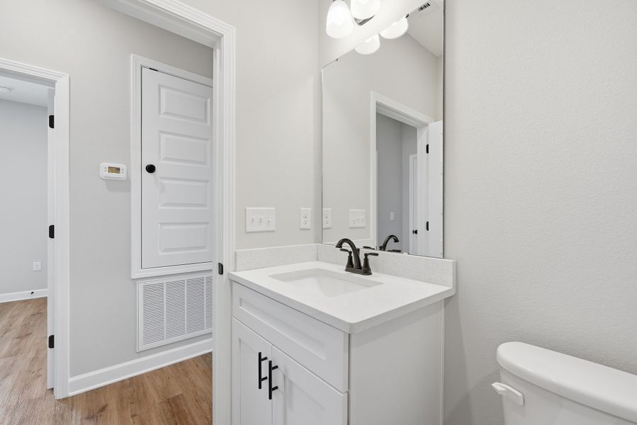 Furnished interior view inside a new home in Southern Charm, Crestview (Image 15).